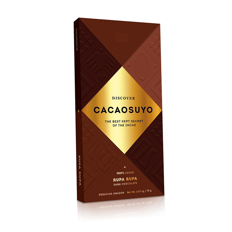 A chocolate box with a golden label on it.