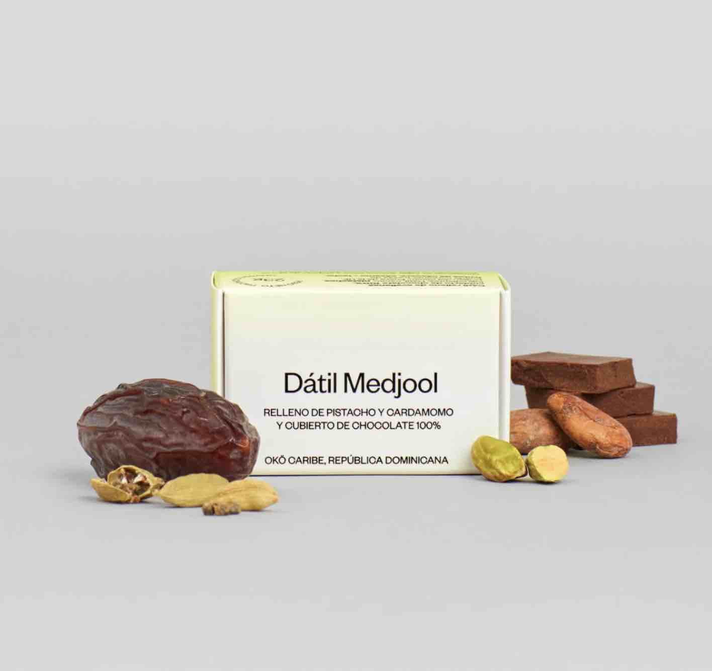 a box of medicool next to some nuts
