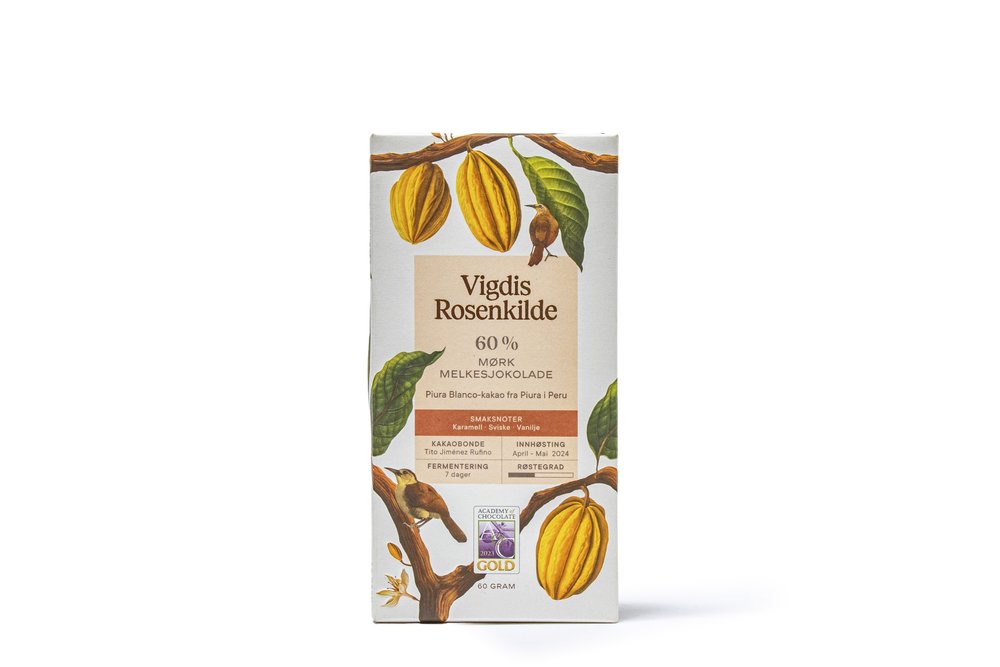 A slab of chocolate with cacao pods, leaves, and birds on the packaging.
