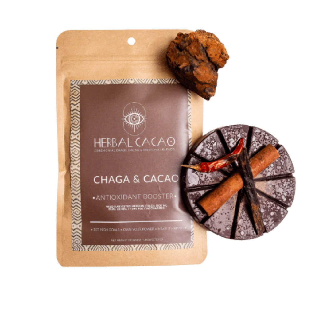 A bag of chaga cacao next to a piece of chocolate.