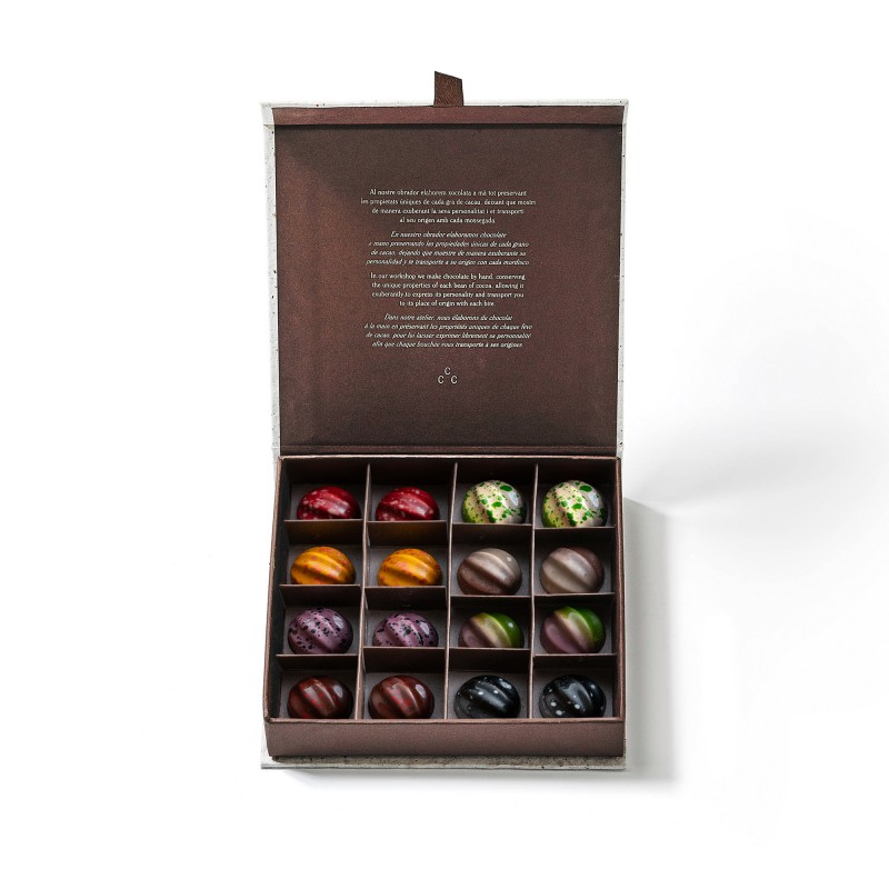 A box of speciality chocolates from Casa Cacao sitting on top of a white table.