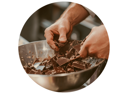 a person scooping chocolate into a bowl