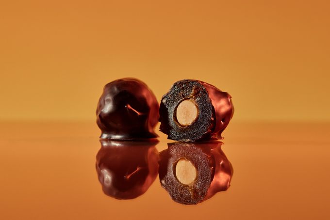 Medjool dates covered chocolate filled with hazelnuts