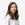 a woman in a white shirt is posing for a picture
