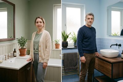a man and a woman standing in a bathroom