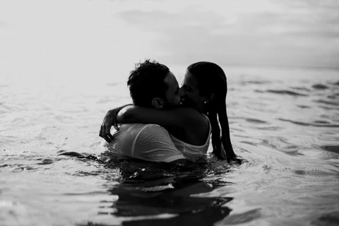 a couple of people that are in the water