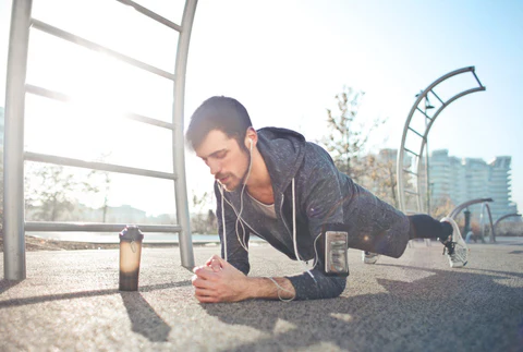 a man is doing push ups on the ground