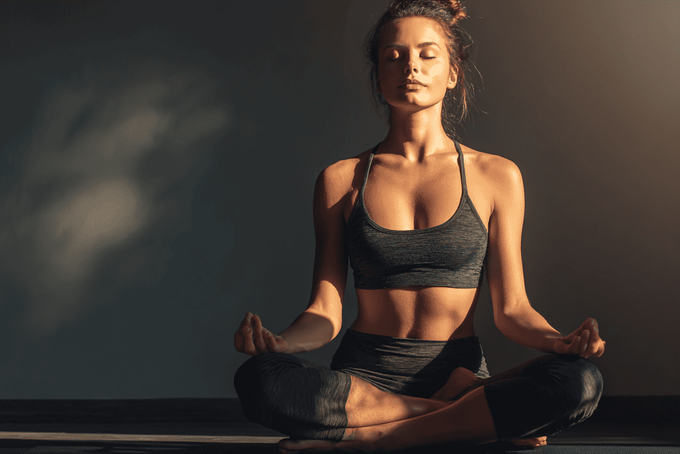 Ben Wa Balls vs. Kegel Devices: How Biofeedback Aids Pelvic Health A woman trying to use do Kegels using Ben Wa Balls.