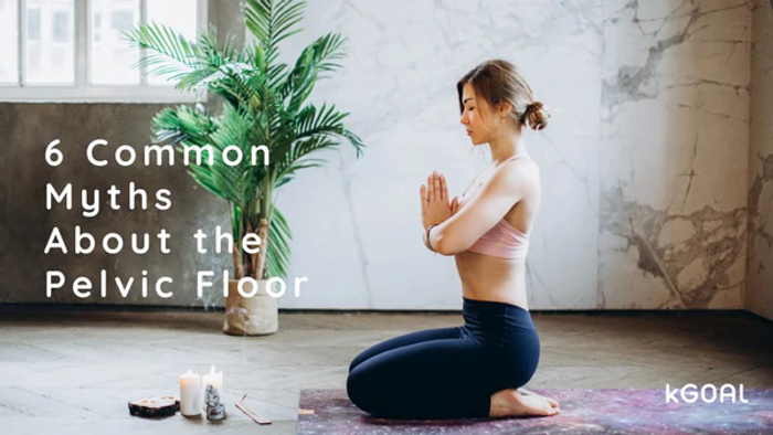 a woman sitting on a yoga mat in front of a potted plant