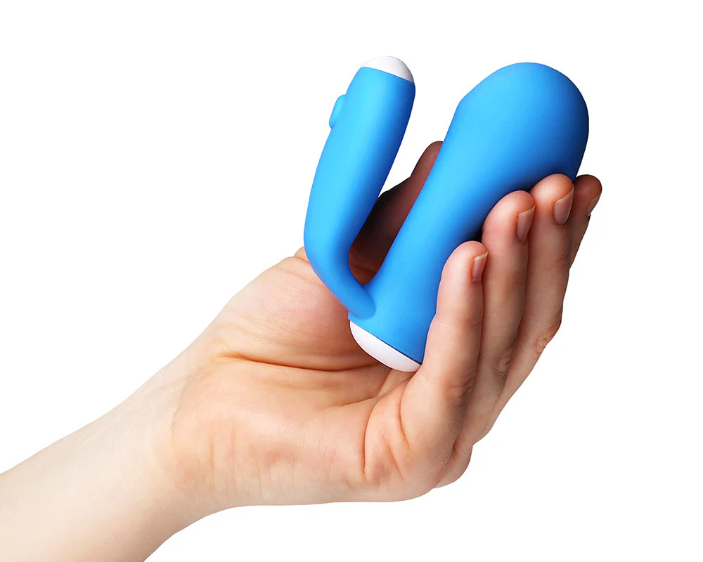 a person holding a blue object in their hand
