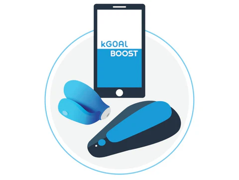 a cell phone sitting next to a pair of scissors