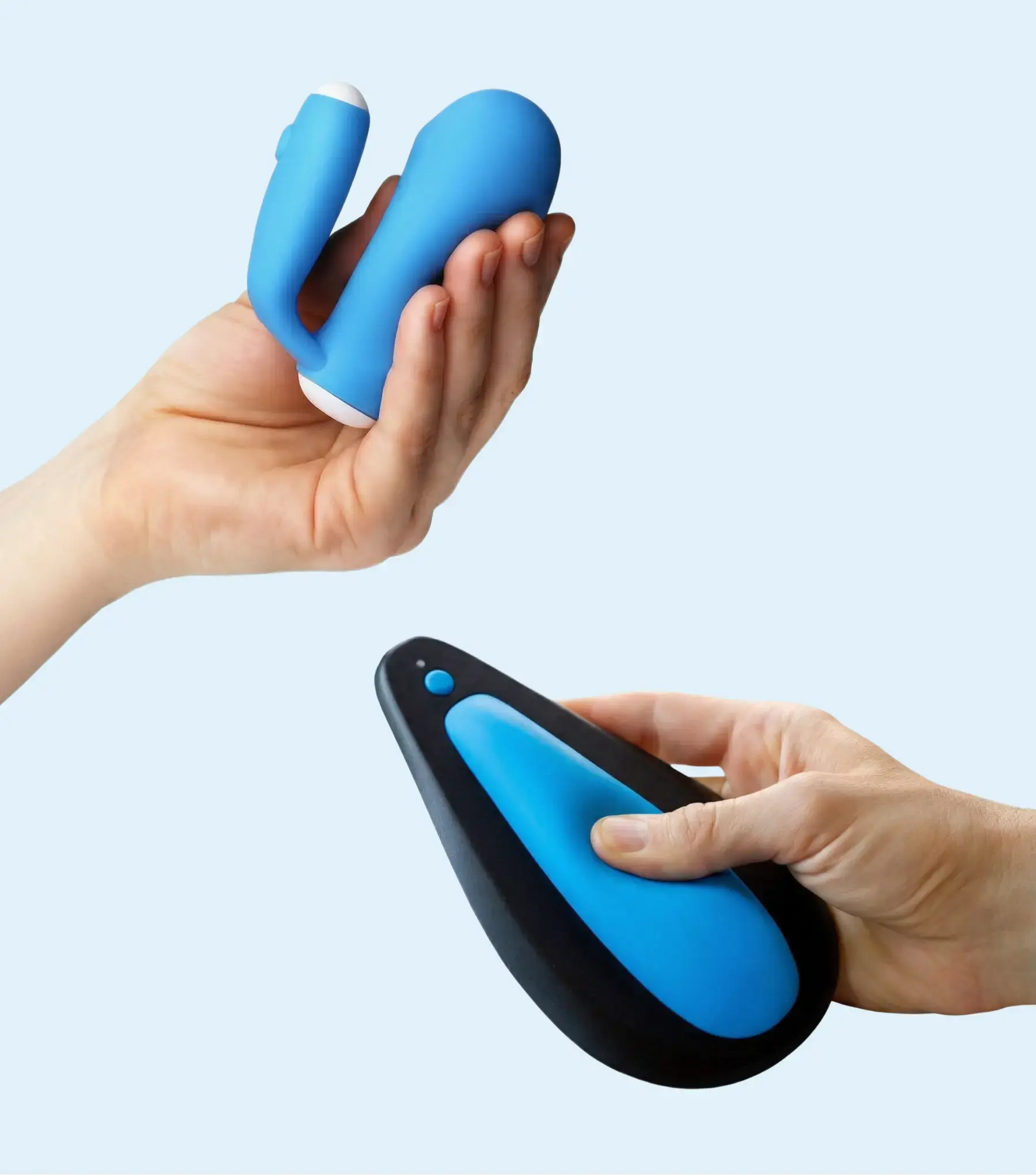 a pair of hands holding a blue object