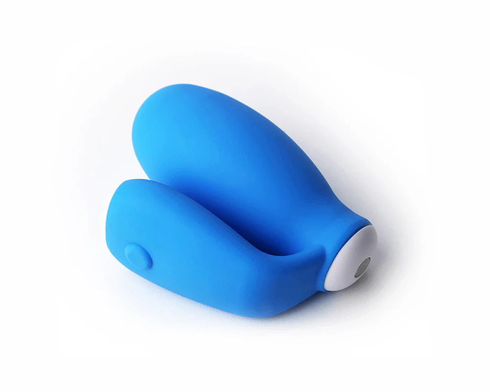 a blue object sitting on top of a white surface