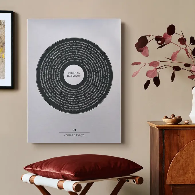 a picture of a room with a chair and a poster on the wall