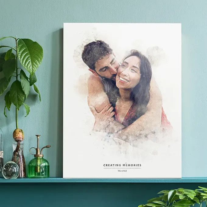 a picture of a couple on a shelf next to a potted plant
