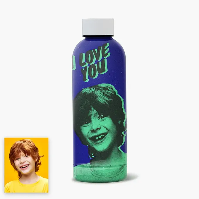 a blue bottle with a picture of a boy on it