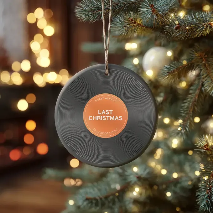 a christmas ornament hanging from a christmas tree
