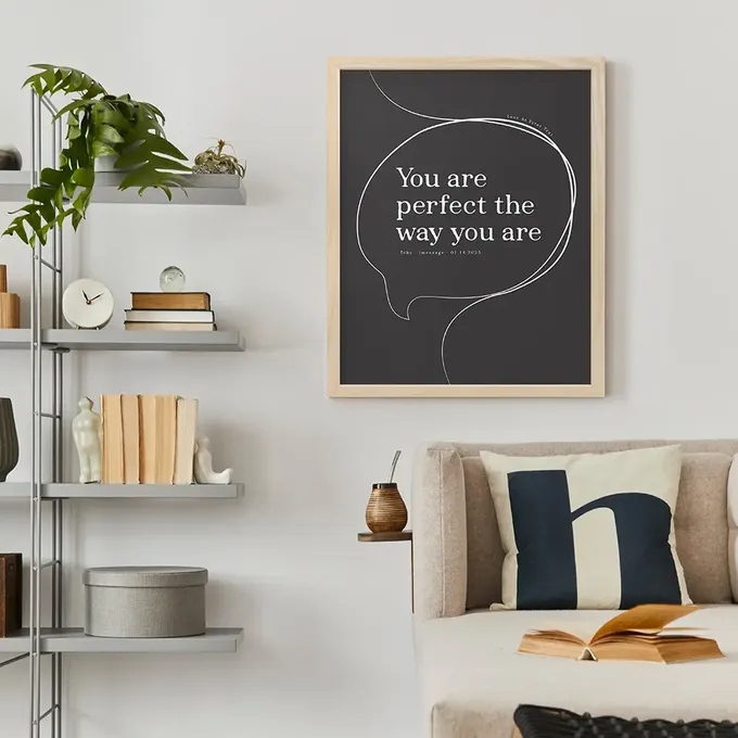 a living room with a couch and a book shelf