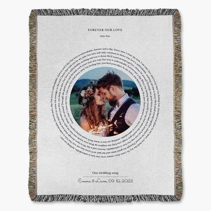 a blanket with a picture of a couple on it