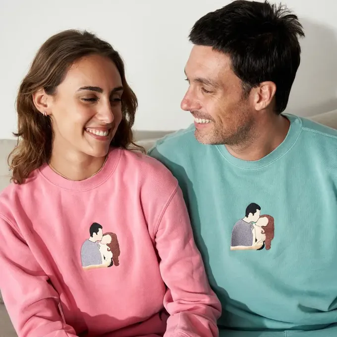 a man and a woman sitting on a couch