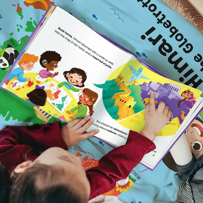 a child reading a book on a bed