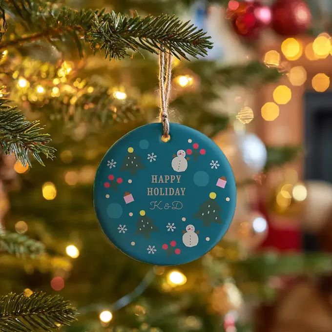 a christmas ornament hanging from a christmas tree