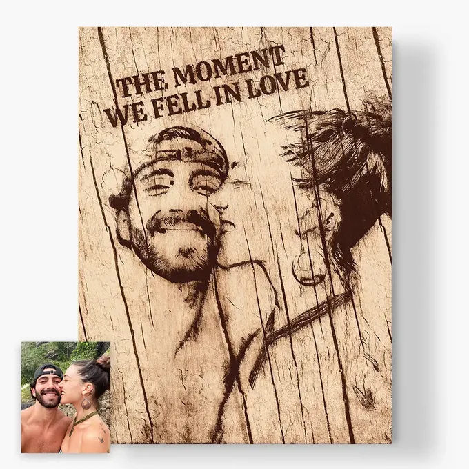 a wooden plaque with a picture of a man and woman kissing
