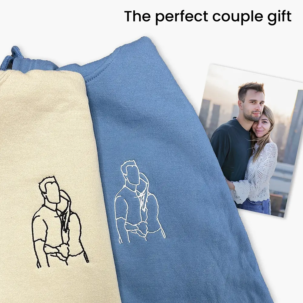 a couple's hoodie with a picture of a man and a woman on them