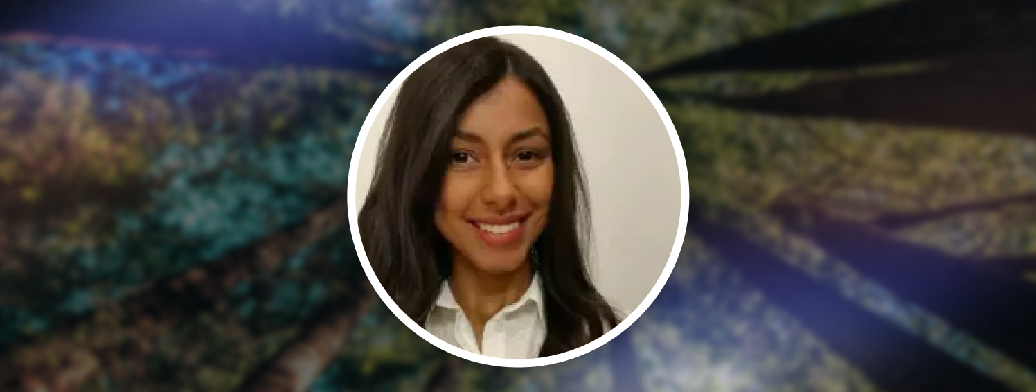 a woman with long hair and a white shirt