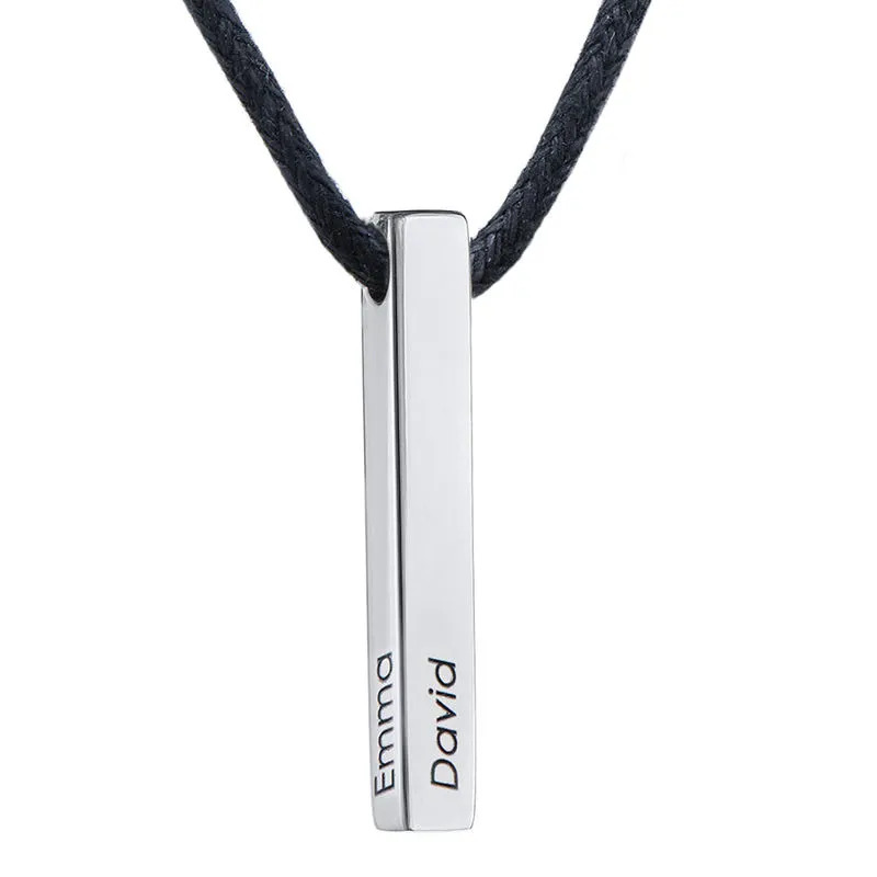 A sterling silver vertical bar necklace with a thin black rope string 