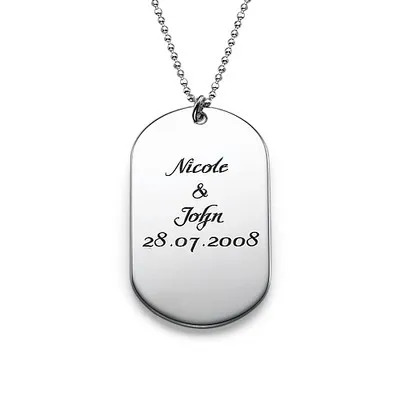 A sterling silver necklace with an engraved dog tag pendant 