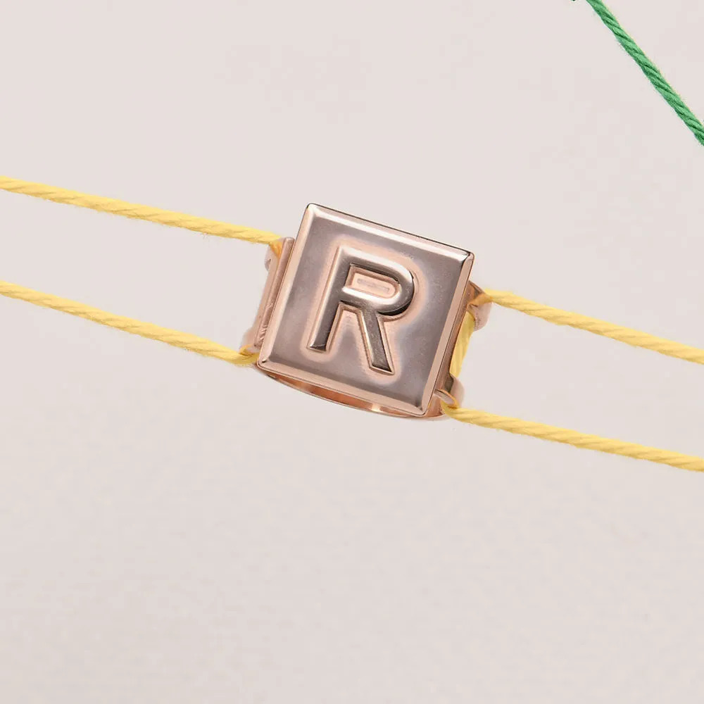 Stock image of a Unisex Cubic Initial Ring in Rose Gold Vermeil