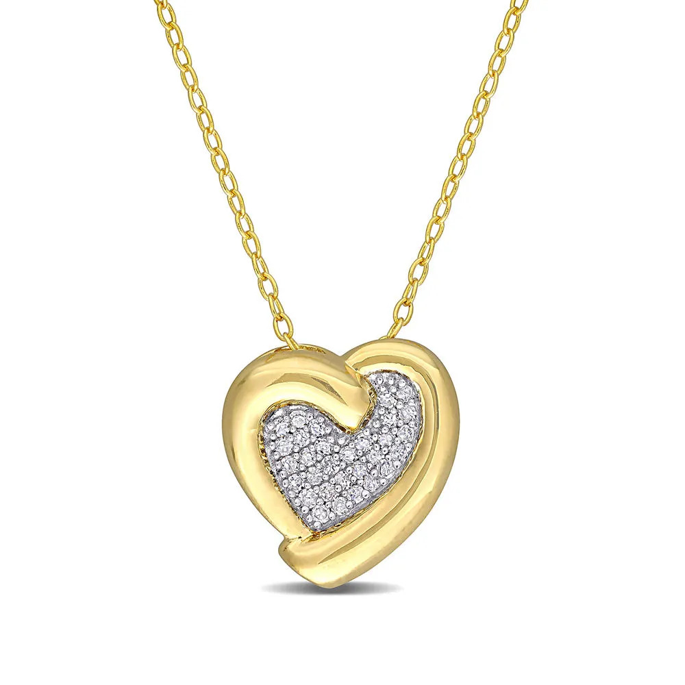 A gold plated necklace with a gold and diamond covered pendant 