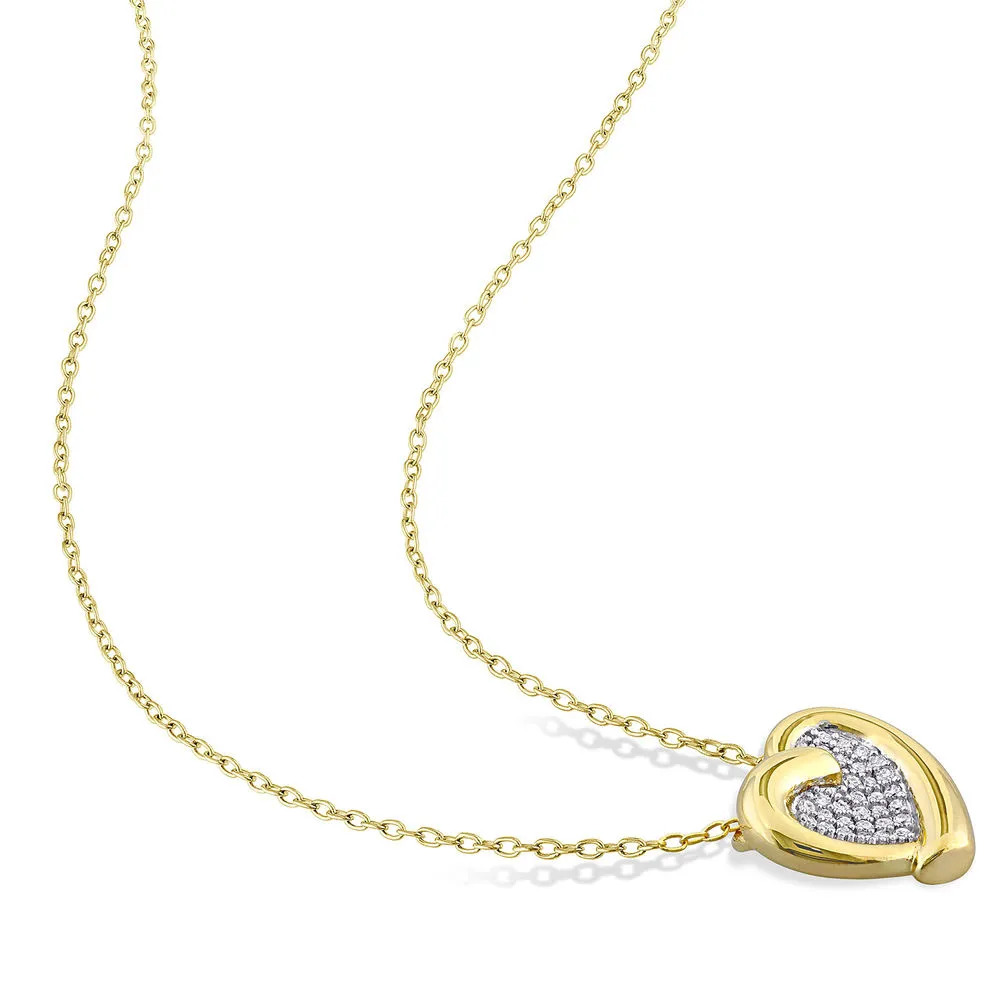 A gold plated necklace with a gold and diamond covered pendant 
