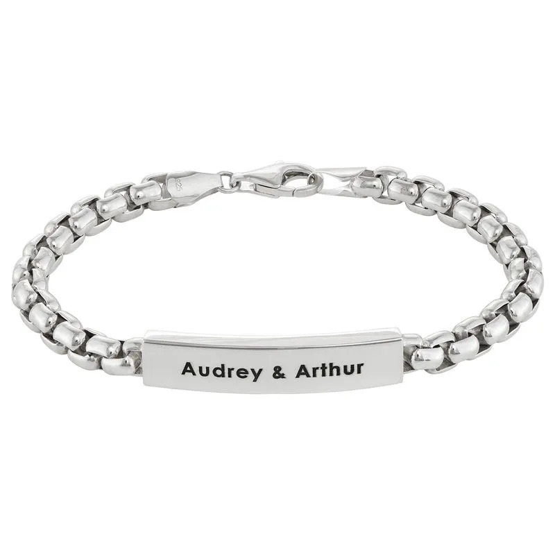 Stock image of a sterling silver bracelet for men with an inscription 
