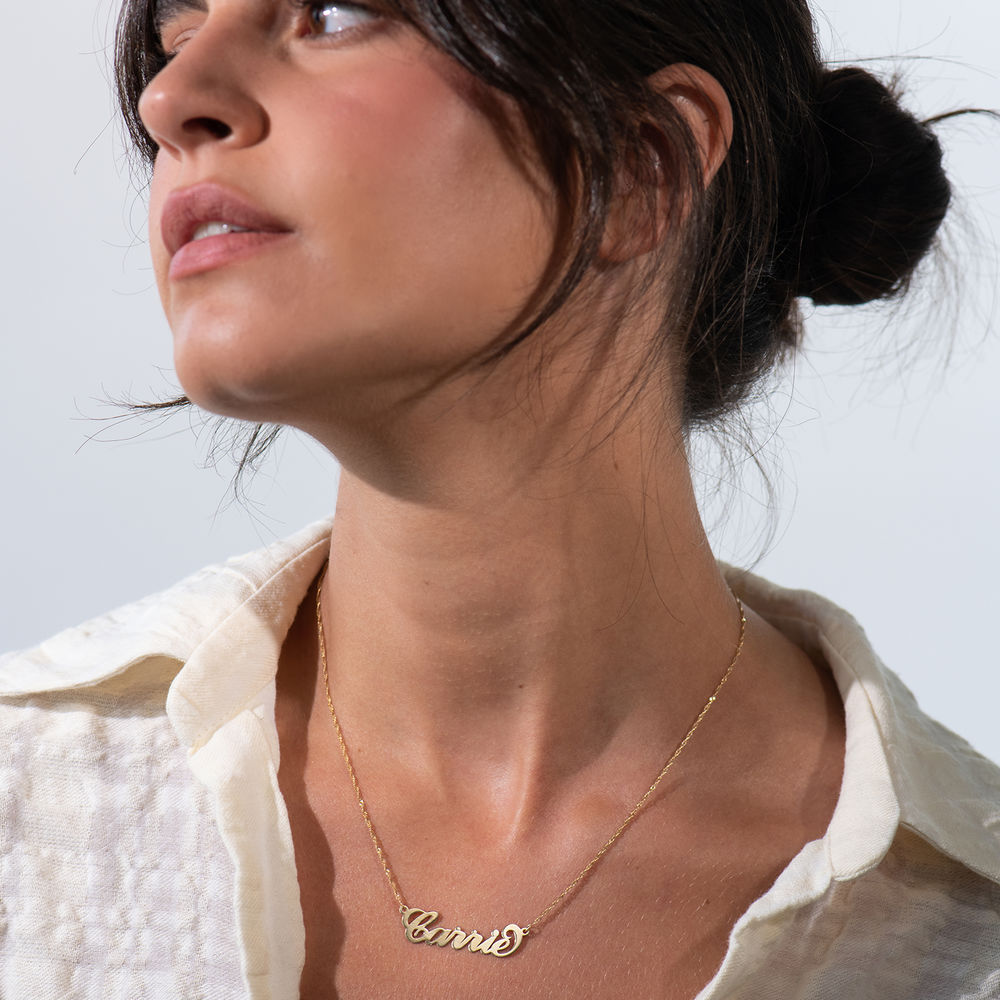 Woman wearing a Personalized 14k Gold Carrie Name Necklace 