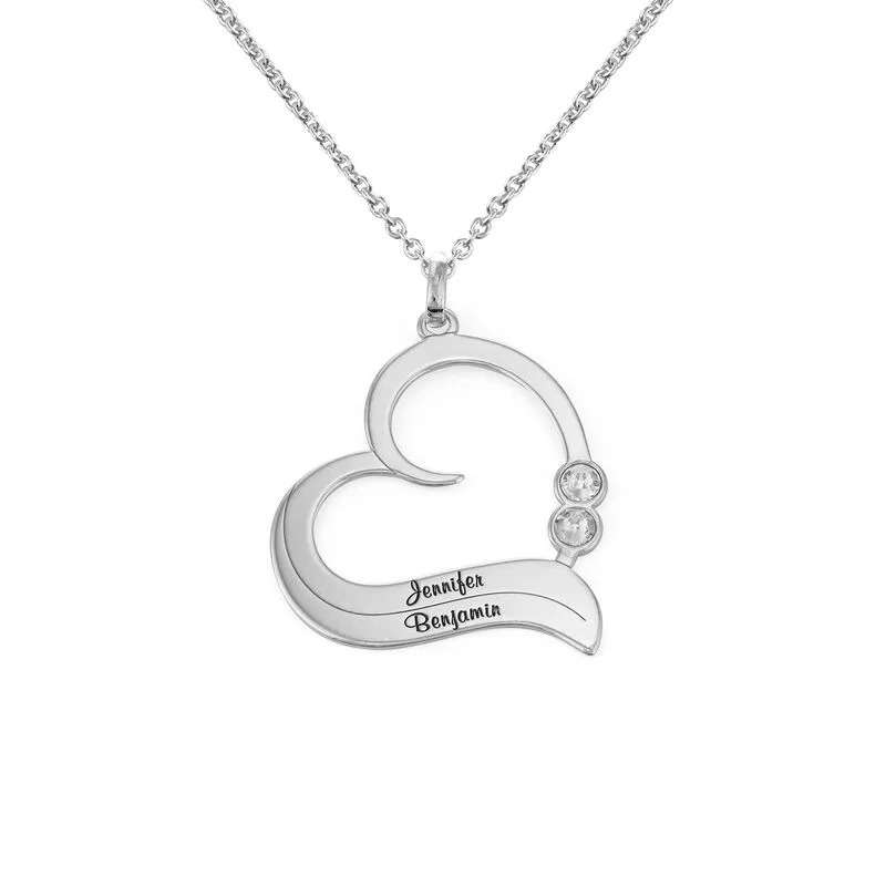 A sterling silver personalized heart necklace with a birthstone 