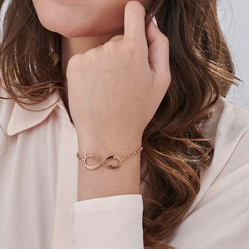 Woman wearing a personalized Infinity Rose gold plated bracelet with diamond 