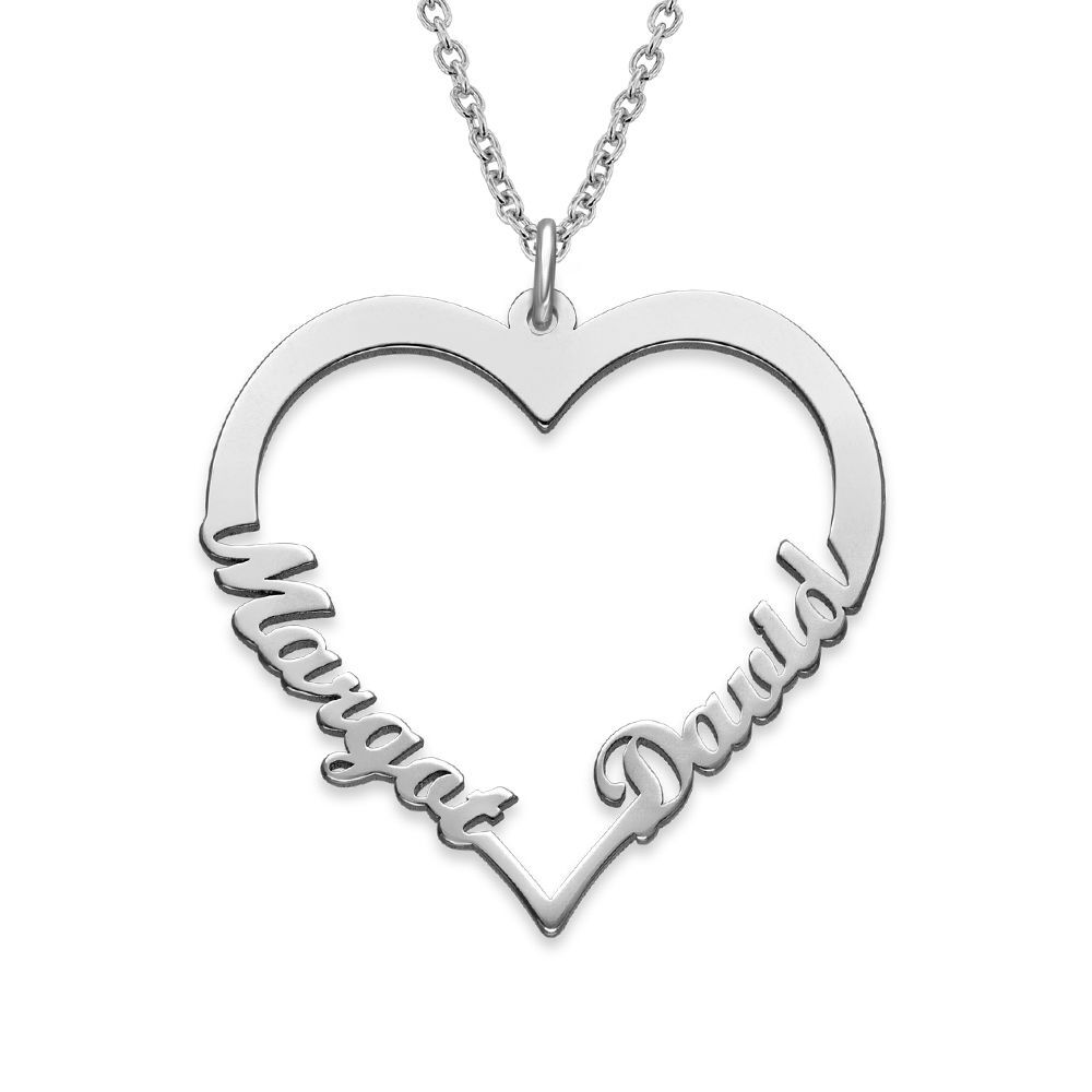 A sterling silver necklace with a heart shaped pendant made from two names 