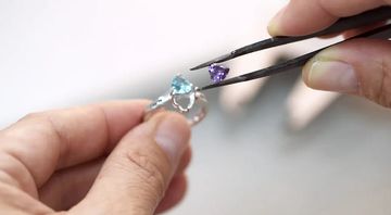 a person crafting a personalized promise ring