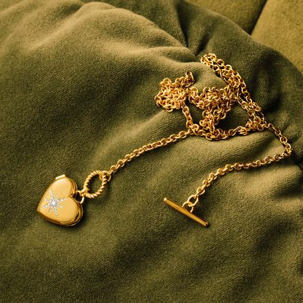 Heart Photo Locket in Gold Finish on dark green velvet