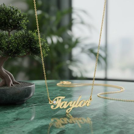 a bonsai tree with Taylor name plate on a table