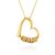 A Gold Plated Necklace with Engraved Beads on a heart shaped pendant