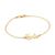 A tiny gold plated bracelet with a name inscription 