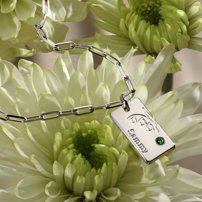 a close up of a flower with a tag on it