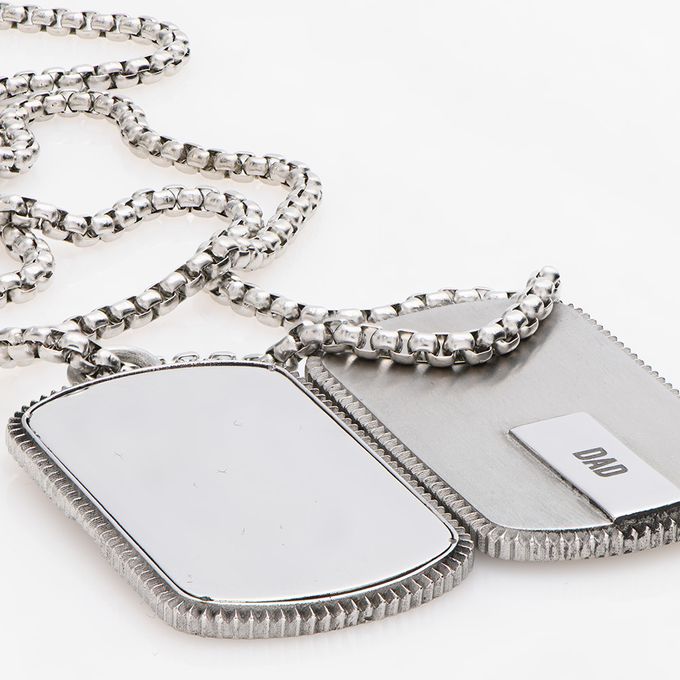 a couple of tags that are on a chain