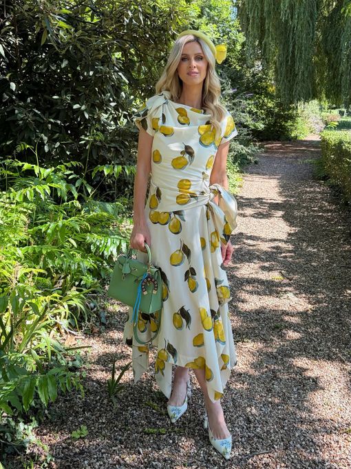 Nicky Hilton wearing the Fortune Found Horseshoe Initial Bag Charm