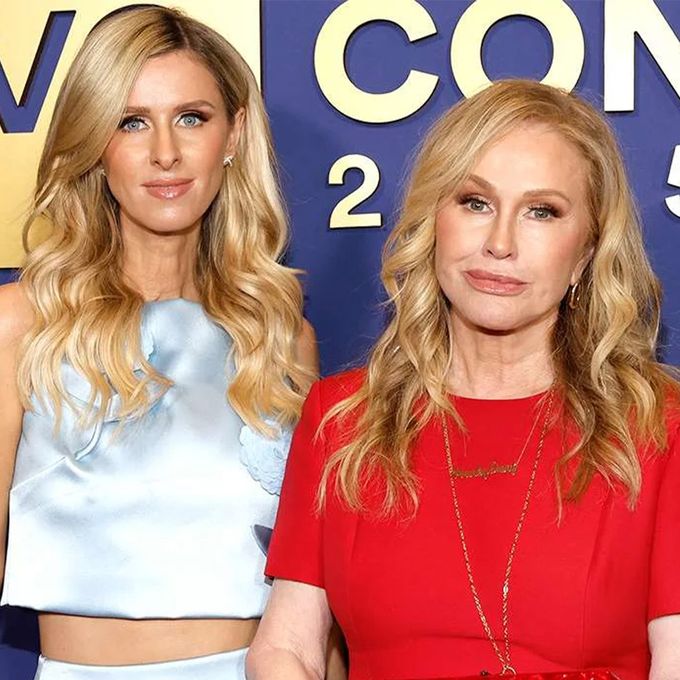 a couple of women standing next to each other