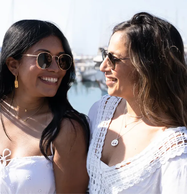 a couple of women standing next to each other