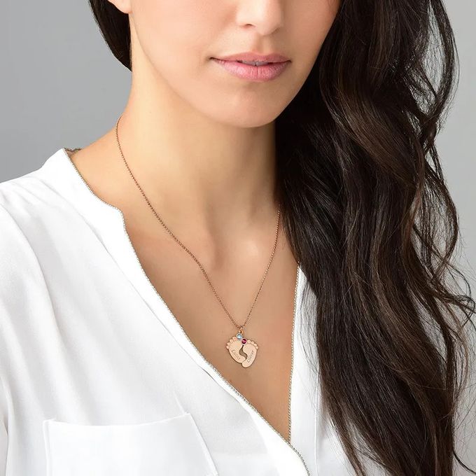 Model wearing the Baby Feet Necklace with  Birthstones 
